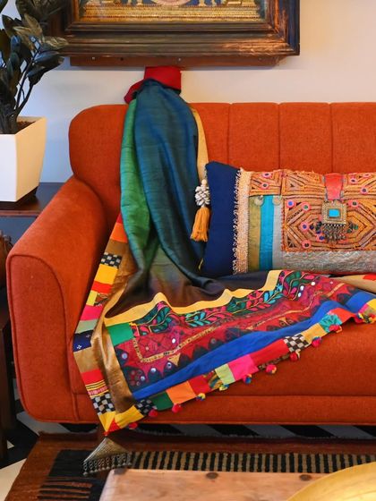 Another view of the vibrant Banjara throw, showcasing its rich colors and textures. This is a perfect example of an upcycled, one-of-a-kind heirloom piece.