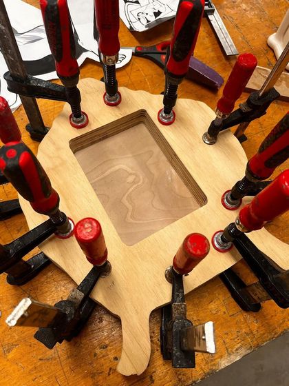 Duplicate image of the clamped wood form.