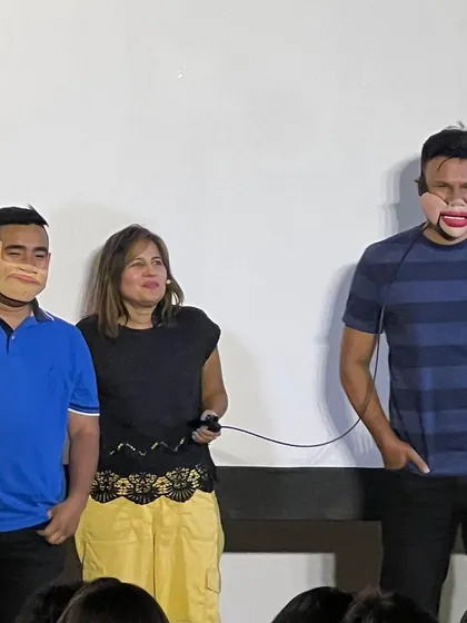 Two volunteers from the Everest Toastmasters event become my puppets for the evening. This is a great way to liven up conferences and formal gatherings.