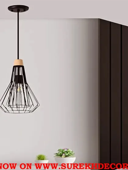 A stylish metal hanging light with a geometric cage design in an antique black finish. This fixture is perfect for showcasing a vintage-style Edison bulb and adds an industrial-chic touch to any space.