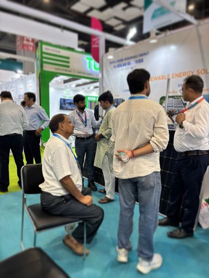 A busy scene at our expo stall, with our team members in discussion with potential clients. These interactions are vital for understanding customer needs and providing tailored solar solutions.