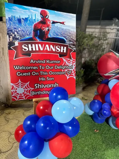 A close-up of the custom Spiderman welcome sign, greeting guests at the birthday celebration.