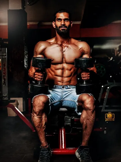 Overthinking will destroy you. Stay focused, stay consistent. A shot from a professional photoshoot in the gym, showcasing a ripped physique.
