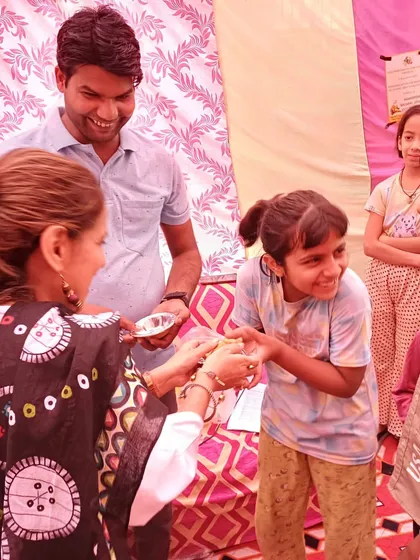 A heartwarming moment of connection while distributing prasad to the children at the Maharishi Valmiki Jayanti event. For me, community events are about creating a sense of togetherness and joy for everyone involved.