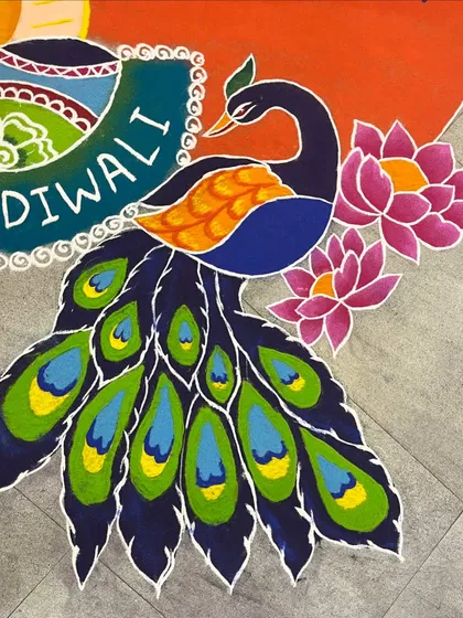 A close-up of the peacock and lotus details from a corporate commission. I focus on clean lines and rich color blending to ensure every element of the rangoli is sharp and visually appealing.