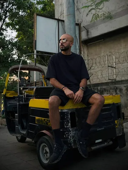 Soaking in the local culture in India. A quick photo on a classic auto-rickshaw before heading to the next event.
