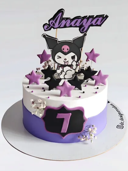 A Kuromi-themed cake for a 7th birthday. This design captures the mischievous but cute character from the Sanrio universe with a purple and black color scheme.