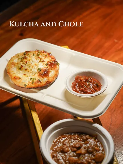 A comforting plate of Kulcha and Chole, a classic North Indian dish executed perfectly.