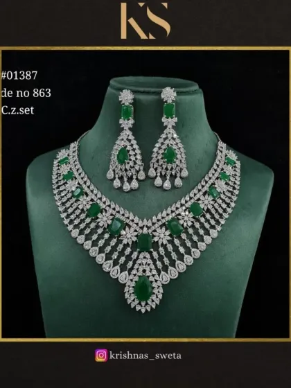 This C.Z. set in classic emerald green is a timeless and elegant choice. It can be dressed up or down for various occasions.