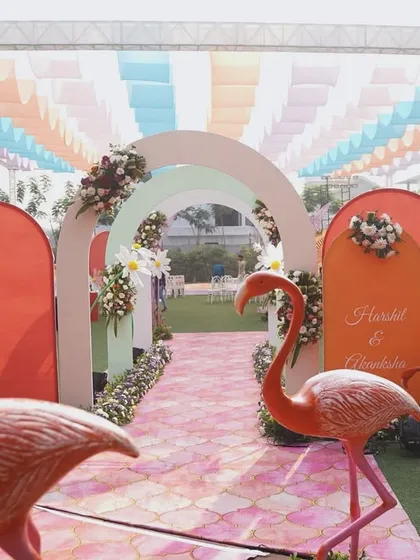 A whimsical entrance for a pastel carnival. I used playful flamingo figures, a pink patterned aisle, and soft, arched doorways to welcome guests into a world of fun and fantasy.