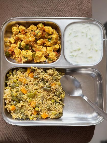 A repeat of the flavorful vegetable pulav with paneer bhurji and cucumber raita.
