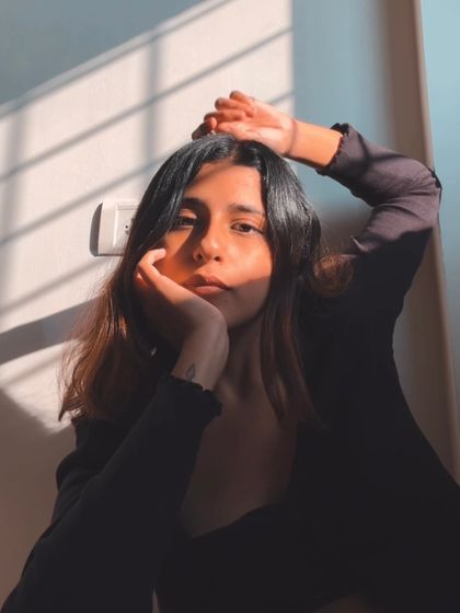 A portrait playing with shadows and light.