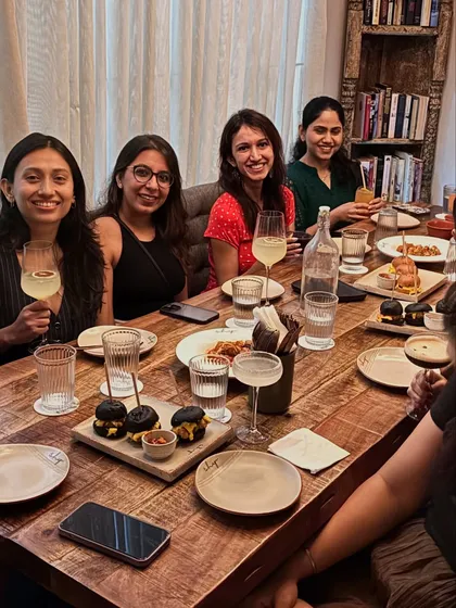 After a day of hard work, we come together to relax and refuel. These moments over a shared meal are just as important as the time we spend on the mat. This is where the friendships are sealed and our community becomes family.