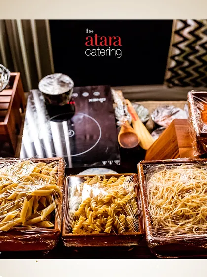 A close-up of the pasta options available at our live station. We provide different types of pasta like penne, fusilli, and spaghetti to cater to all preferences.