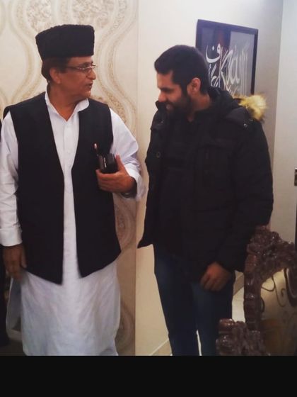 A candid moment of discussion with Mr. Azam Khan. Open dialogue is key to understanding any situation.