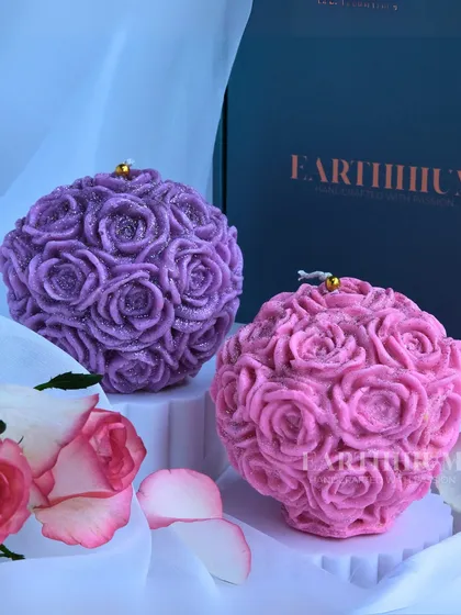 My floral sphere candles are like everlasting bouquets. This one is made of dozens of tiny roses, shown here in purple and pink.