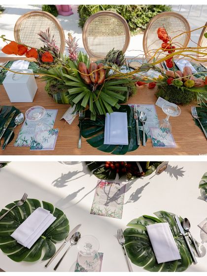 A tropical-themed table setting with monstera leaf placemats and exotic floral centerpieces. This design brings a touch of the outdoors in for a fresh and vibrant feel.