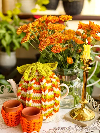 I love adding a little desi touch to my creations. This tea cozy set, with its bright saffron, white, and green stripes and matching kulhad covers, is my nod to Independence Day, perfect for a festive morning chai.