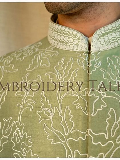 Embroidery Tales. This silk jacket is an exquisite creation of elegance, embracing intricate floral dori artistry for a refined look.