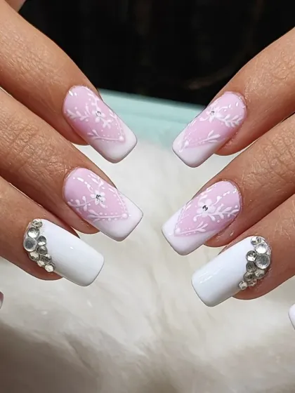 A close-up of the floral French design, allowing you to see the intricate details I hand-paint on each nail.