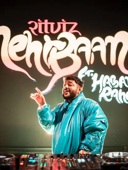 Ritviz performing his hit 'Mehram' at our White Party. We curate lineups with some of the biggest names in Indian pop and electronic music, complete with custom on-screen visuals for their sets.