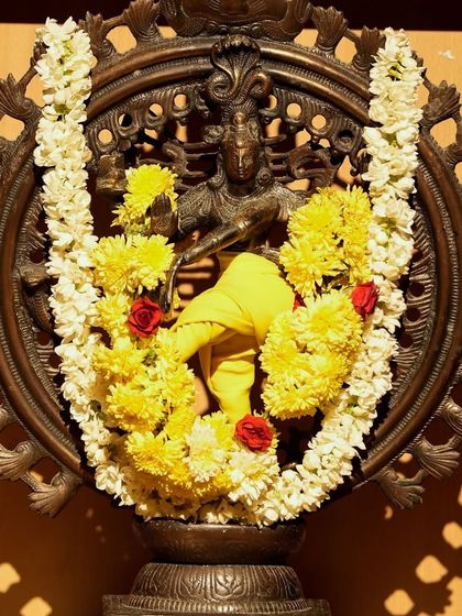 The Nataraja idol, adorned with flowers for Nrithya Sandhya. We seek his blessings before every performance as he is the Lord of Dance.