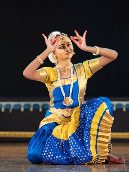 A student performing the Allaripu at Nrithya Milanam 2022. This solo moment showcases the confidence and skill that students develop through our training.