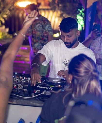 A great shot of me interacting with the crowd from the DJ booth. Connection is key.