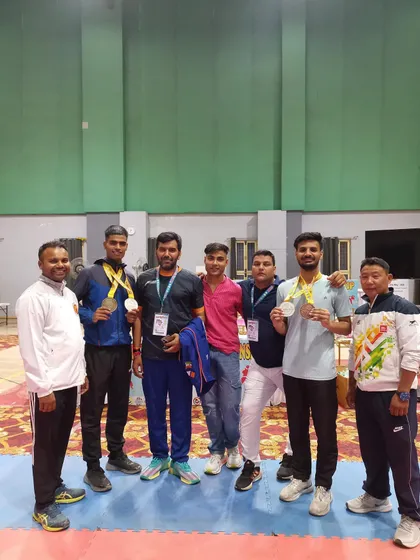 A group photo with our medal-winning students and coaches after a successful tournament in Dehradun.