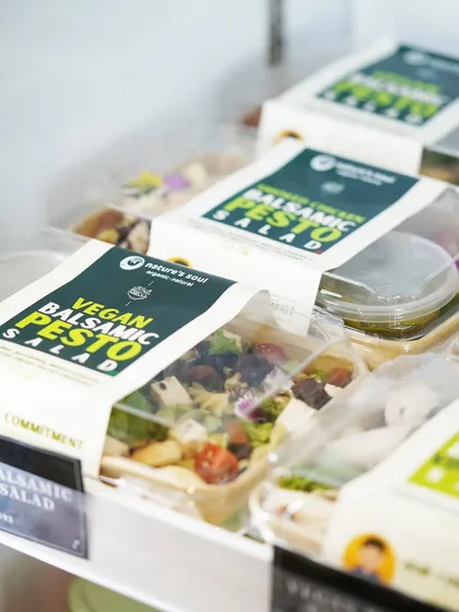 Clean, commercial-style shot of packaged vegan balsamic pesto salads, perfect for showcasing grab-and-go options.