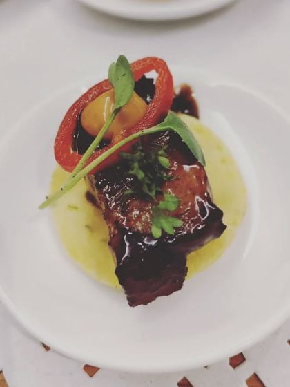 Our Pork Belly dish of the week, slow-cooked to perfection and served as a canapé. It's a rich, flavourful bite that always impresses.