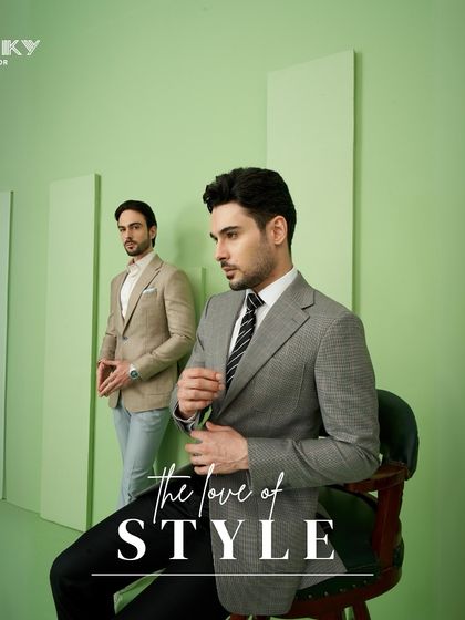 The love of style is in the details. This image captures two distinct looks, a grey plaid blazer and a beige blazer, both tailored for a sharp and sophisticated appearance.