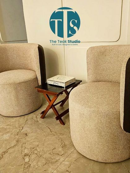 We curated this cozy coffee corner for a client, featuring these beautiful curved barrel chairs. The two-tone upholstery adds a subtle design detail that elevates the entire space.