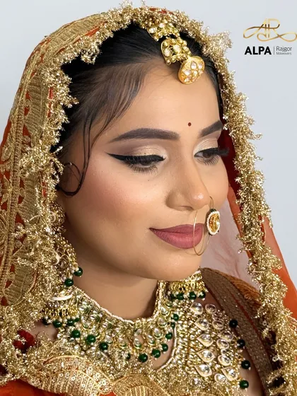 This shot highlights the delicate details of the eye makeup, with soft golden shimmer and a sharp wing, perfect for a traditional bride.