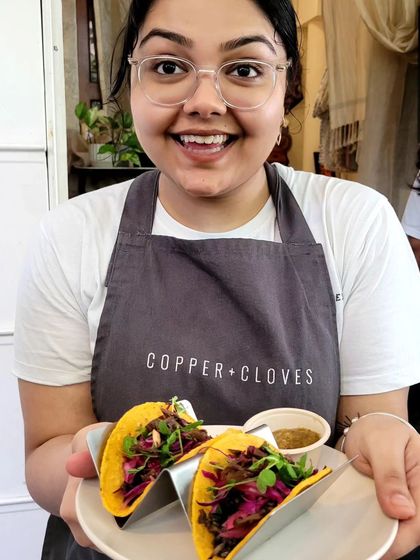 One of our team members proudly presenting the Portobello and Smoked Hiratake Mushroom Tacos during our Mushroom Festival.