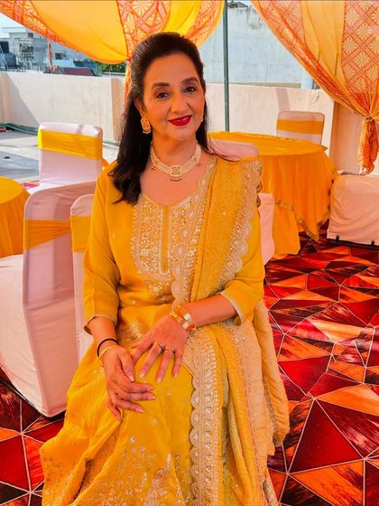 The client looking radiant and enjoying the function.