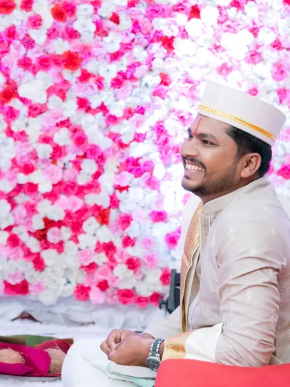 A happy groom enjoying his wedding ceremony.