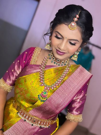 The complete look for this engagement ceremony. The bride looks happy, confident, and absolutely beautiful.