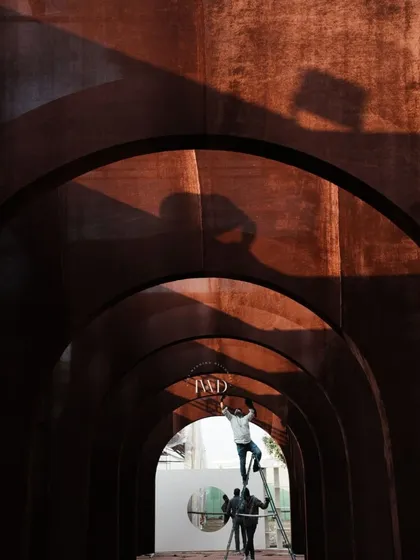 The making of a midsummer night's dream sangeet in Jammu. This shot captures our team at work, building the grand arched entrance that will soon welcome guests into a world of magic and music.