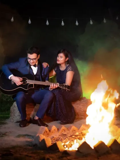 Another take on the romantic campfire shoot. The mix of warm firelight and colored smoke creates a magical and dramatic effect for this pre-wedding photo.