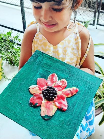 A little snippet from my ongoing classes for 3-year-olds. We're working with air-dry clay to make these lovely flower canvases.