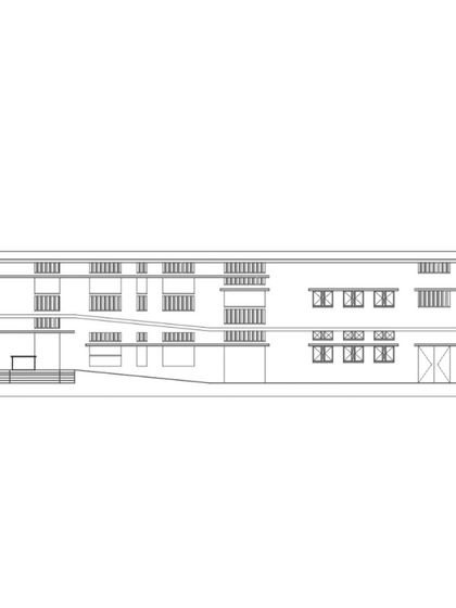 A sectional elevation of Buddhi School, revealing how the different floor levels and roof structures work together to create varied and well-lit interior spaces.