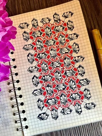 This geometric pattern in red, black, and white has a bold, graphic quality. Drawing these repeating shapes is a meditative practice for me, helping me find calm in the middle of a busy day.