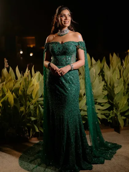 The complete reception ensemble. The soft, timeless makeup provides the perfect balance to the intricate details of her Tarun Tahiliani gown, creating a look of pure elegance for her special night.