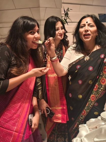 Sharing a moment of joy and cake after the award ceremony.