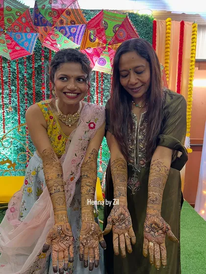 Like mother, like daughter. It was a joy to create complementary traditional designs for both the bride and her mother.