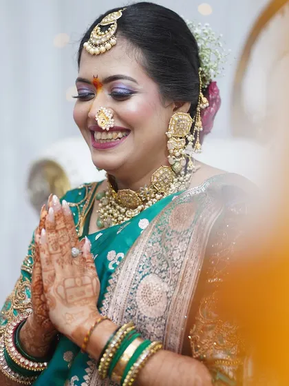 A joyful candid moment, her smile says it all. The makeup is waterproof and long-lasting, perfect for emotional moments.