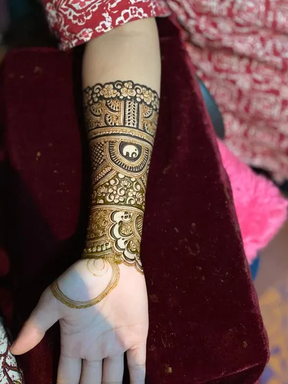 The same practice design, showing how the pattern wraps around the arm.