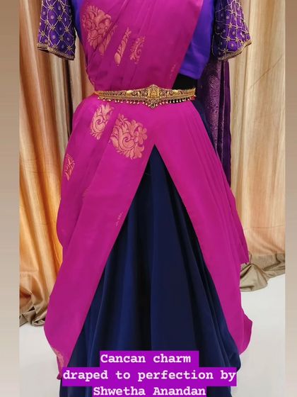 Another view of the can-can drape, showing how the saree is styled over a lehenga or skirt to create a fusion look that is both traditional and contemporary.