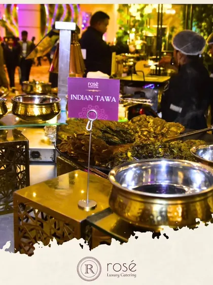 The Indian Tawa station is a hub of activity and flavor. Set amidst a bustling event, our chefs cook a variety of tawa vegetables and meats, creating a rustic and authentic dining experience.